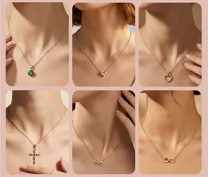 Elegant collection of necklaces featuring heart, cross, and infinity pendants on model