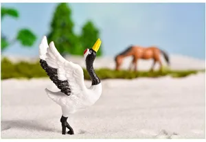 Mini red-crowned crane animal figurine for succulent micro landscape photography and decor.