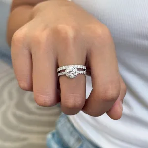 Detailed view of an S925 silver engagement ring set with a D color moissanite halo