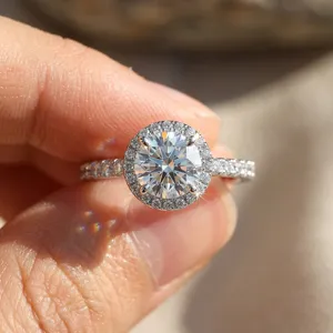 Close-up macro detail of brilliant-cut halo moissanite ring in S925 sterling silver band