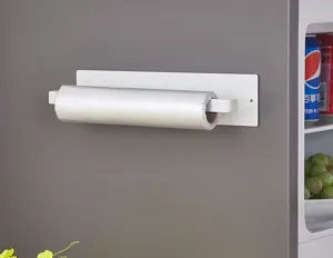 White magnetic kitchen paper towel holder with plastic wrap on refrigerator side