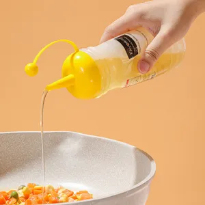 Large plastic squeeze bottle for kitchen oil and sauce with precise yellow tip dispenser