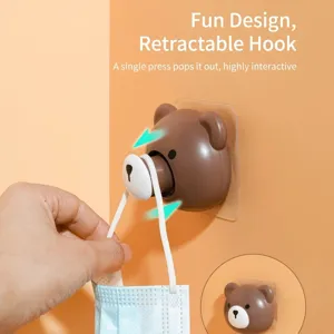 Creative retractable brown bear adhesive wall hook for mask and cable management