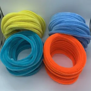 Close-up detail of fluffy chenille stems, vibrant colors, ideal for DIY floral craft projects.