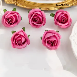 Close-up detail view of artificial pink silk rose flower heads for DIY crafts and decor.