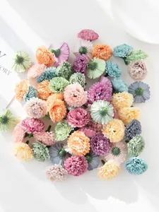 Detail view of colorful artificial chrysanthemum flower heads, perfect for DIY crafts and accessories.