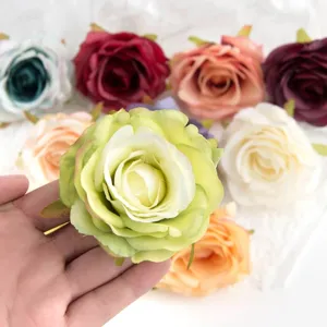 Artificial silk rose flower heads close-up detail for DIY crafts and wedding decor