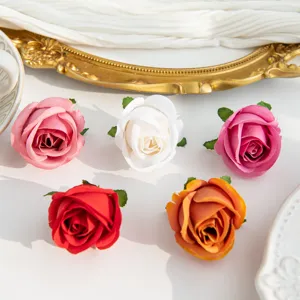 Artificial rose flower heads for DIY crafts, wedding decoration, and floral wall decor.
