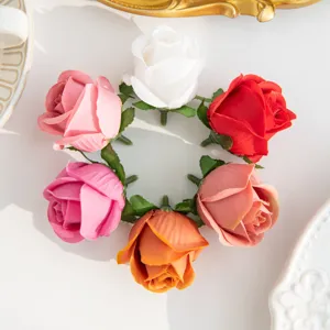 Artificial silk rose flower heads for DIY wedding party home decor and craft accessories.
