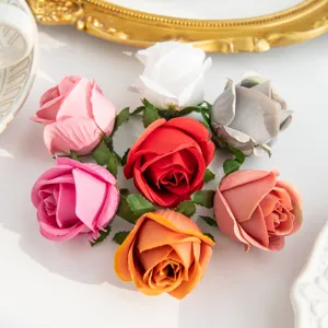 Artificial silk rose flower heads, colorful DIY craft faux roses for wedding decor.