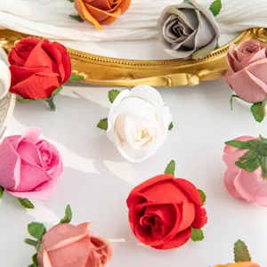 Artificial rose flower heads in assorted colors, perfect for DIY wedding wreaths and decor details.