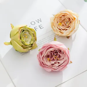 Artificial rose flower heads for DIY handmade corsage and wedding decoration. Realistic roses.