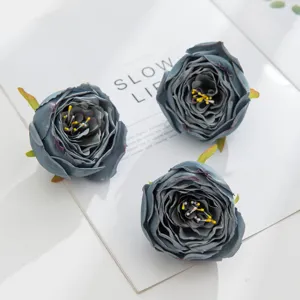 Artificial rose flower heads for DIY crafts, wedding decor, corsages, and floral walls.