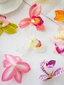 Artificial film Cymbidium orchid flower petals detail, perfect for cake and dessert table decor.