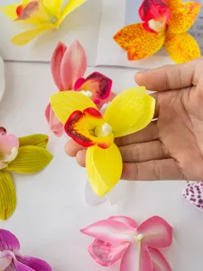 Artificial film orchid flowers for cake decoration, dessert table and hair accessories.