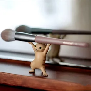 Cute cat pen holder and makeup brush stand resin figurine desk ornament for office.