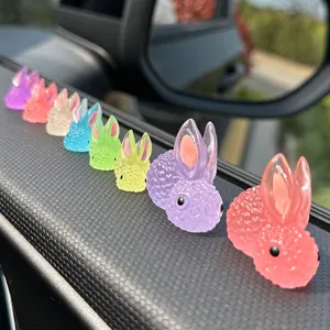 Luminous resin rabbit car dashboard ornaments, cute mini glowing animal decor for auto interior.