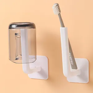 Minimalist self-adhesive wall-mounted multi-functional hooks for bathroom toothbrush and cup storage