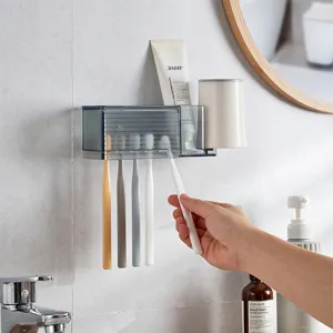 Moderno portaspazzolino grigio da parete e organizer per tazze da bagno ordinato