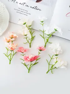 Artificial small flower details, fresh DIY floral accessory arrangement for crafts.