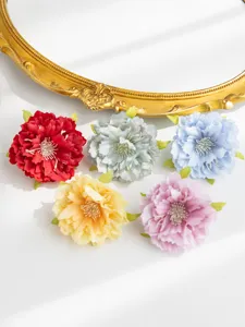 Artificial peony flower heads silk flowers DIY hair accessories floral garland material detail shot.