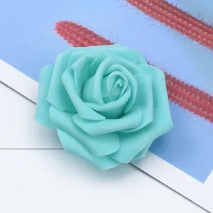 Close up of light blue artificial foam PE rose flower head, perfect for DIY wedding floral crafts.
