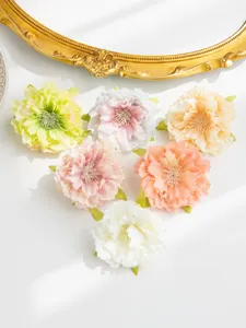 Close-up detail of artificial silk peony flower heads, perfect for DIY hair accessories and wreaths.