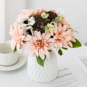 Artificial flower bouquet detail, faux mixed floral arrangement with vase for home decor.