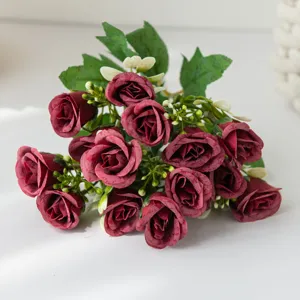 Artificial rose flower bouquet with green leaves, perfect for home decor, wedding and party decoration.