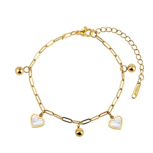 Gold stainless steel link bracelet with heart charms and white shell inlay