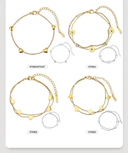 Set of diverse stainless steel bracelets with heart and four-leaf clover charms