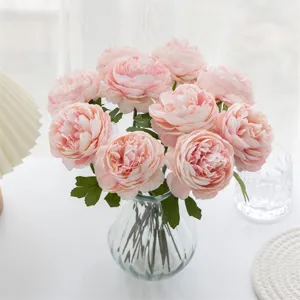 Beautiful artificial pink peony flower bouquet with clear glass vase for elegant home decor.
