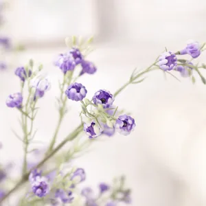 Purple artificial baby's breath flower bouquet detail view, delicate floral home decor