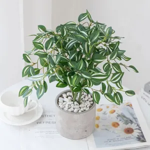 Artificial green plant potted decoration, realistic striped leaves for home desktop decor.