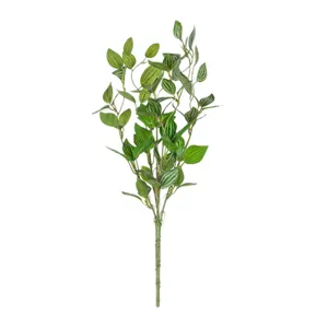 Detailed view of artificial green plant branch, realistic foliage for home decor and floral styling.