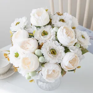 White artificial peony flower bouquet in glass vase for modern living room table decor main view