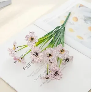 Artificial daisy flower bouquet detail, pink silk screen wildflowers for home decor.