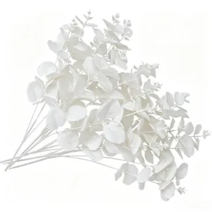 White artificial eucalyptus leaves branch for floral arrangement, fake greenery stems for home decor.