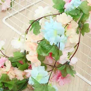 Artificial silk flower vine garland for wedding home decor, colorful fake floral hanging plants.
