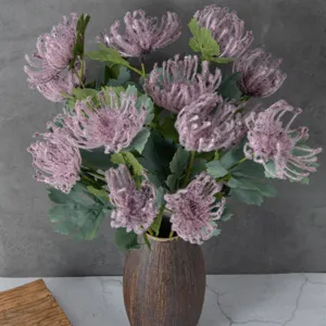 Artificial flocked chrysanthemum flower bouquet with brown vase for home room decor.