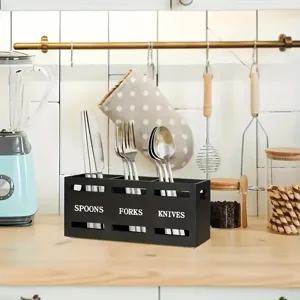 Black wooden cutlery storage box with spoon fork knife labels for kitchen organization.