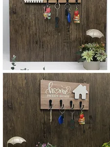 Portachiavi da parete in legno con scritta home sweet home, ideale per decorare l'ingresso di casa.