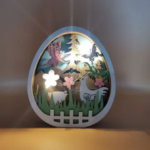 Detailed close-up of the wooden Easter egg LED night light, showcasing layered spring scenery.