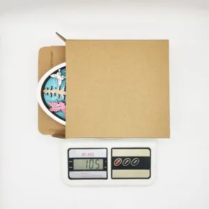 Detailed view of wooden Easter egg craft decoration on electronic scale showing weight.