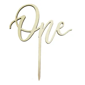 Wooden One cake topper detail view, natural wood finish, close-up dessert decoration.