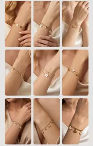 Detail view of various gold stainless steel charm bracelets featuring stars and butterflies