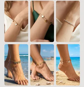 Detailed view of various gold stainless steel bracelets and anklets with charms on models at beach.