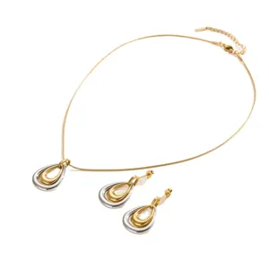 Elegante conjunto de joyas de acero inoxidable bicolor con gota