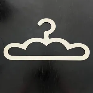 Wooden kids cloud hanger, creative cartoon baby clothes display detail view.