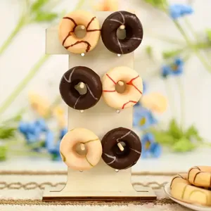 Wooden number donut stand detail showing multiple pegs for wedding and birthday party display.